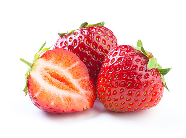 istock Beautiful strawberries isolated on white 636078208