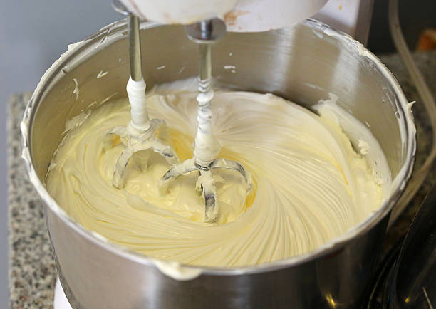 istock Making of a cream for home-made cakes on a mixer 636078710