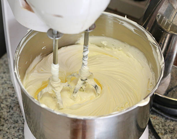 istock Making of a cream for home-made cakes on a mixer 636078752