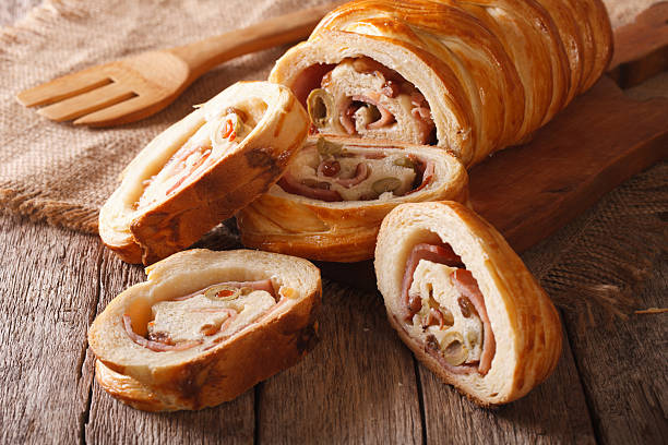 istock Venezuelan cuisine: Christmas loaf pan de jamon close-up. Horizontal 636078920