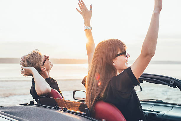 istock couple in cabriolet 636079064