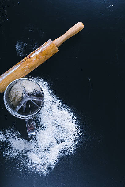 istock utensil for baking on the black board, top view 636079770