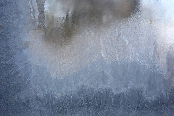 istock covered with frozen ice window glass 636082782