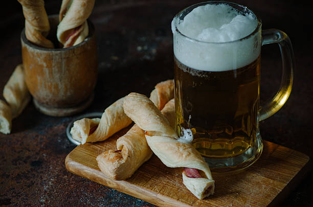 istock Bacon sticks pastry with a glass of beer 636082860