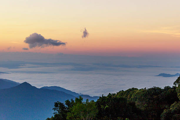 istock High mountain and fog in the morning. 636082884