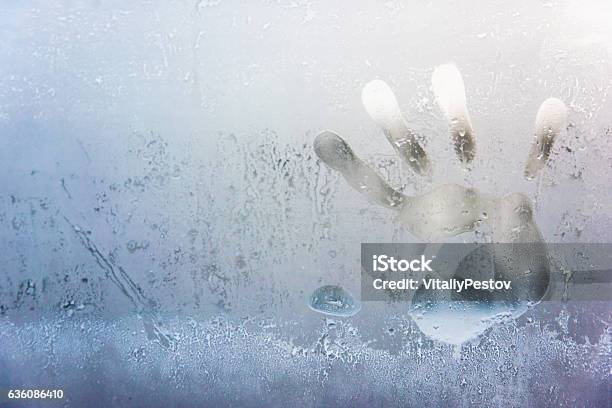 The Handprint Of The Male Palms To The Frosty Glass Stock Photo - Download Image Now