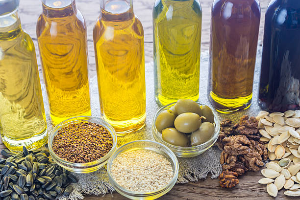 istock Bottles with different kinds of vegetable oil 636089846