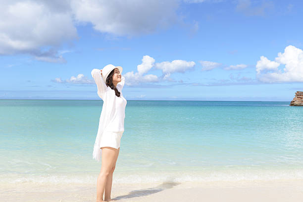 istock The woman who relaxes on the beach. 636090020