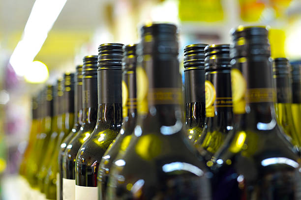 istock Bottles of wine in rows 636091522