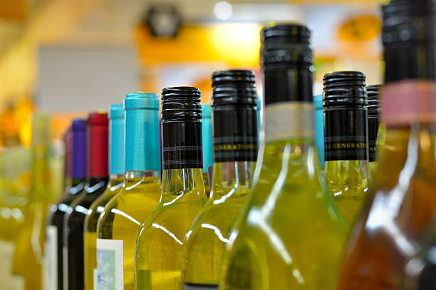 istock Bottles of wine in rows 636091724