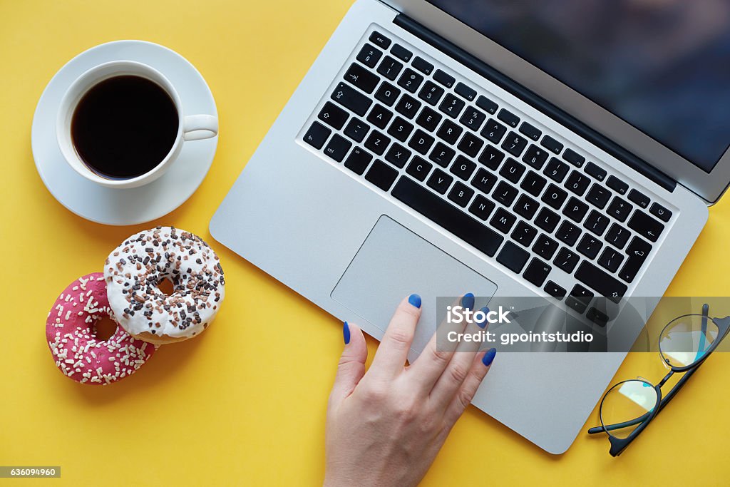 Sweeties and coffee makes your work nicer Board Room Stock Photo