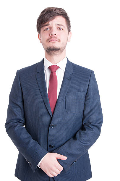 istock Handsome man wearing suit standing serious 636095866