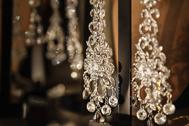 istock Delicious earrings for bride on dark background. Wedding details 636096322