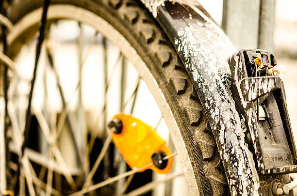 istock old bike with white painting color and broken light 636097268