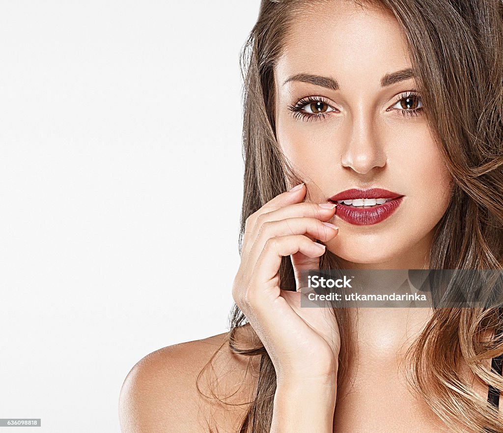 Beautiful woman red lips fly hair portrait Beautiful woman red lips fly hair portrait healthy skin Adult Stock Photo