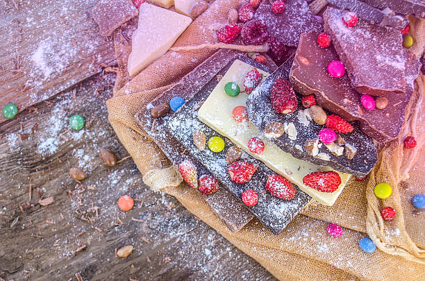istock hocolate mix with colorful candy and fruit 636099524