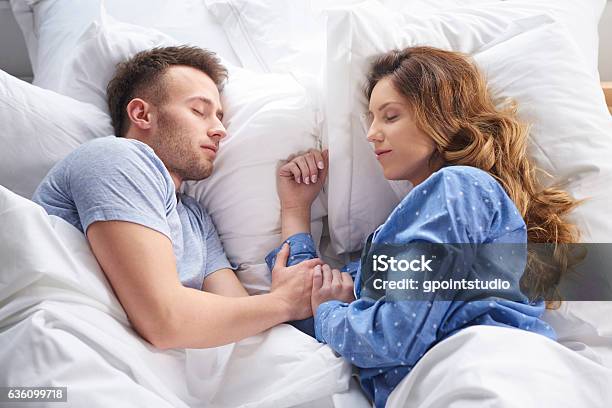 Getting A Peaceful Night Of Rest Stock Photo - Download Image Now - Sleeping, Couple - Relationship, Two People