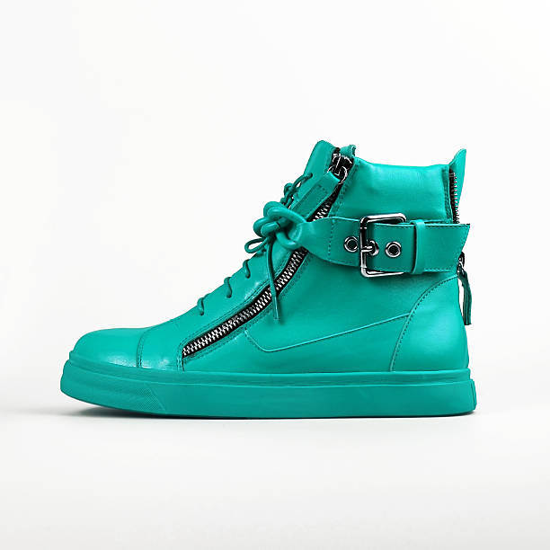 istock female blue shoes over white 636102662