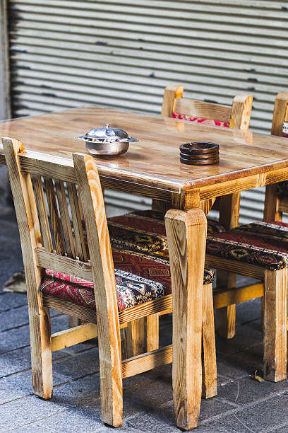 istock Traditional turkish street cafe with small table and chairs outs 636104980