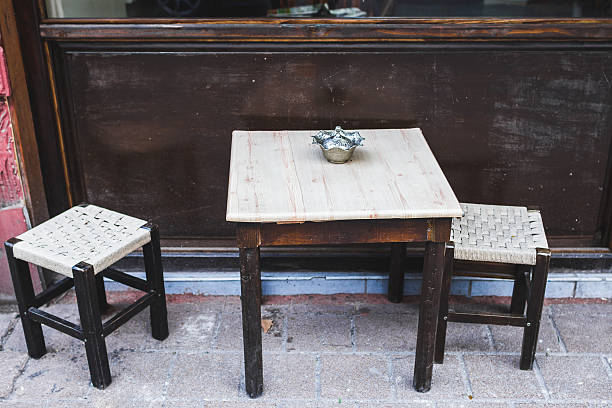 istock Traditional turkish street cafe with small table and chairs outs 636105088