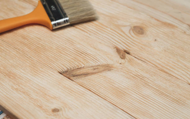istock Wooden surface with new boards before painting. 636115492
