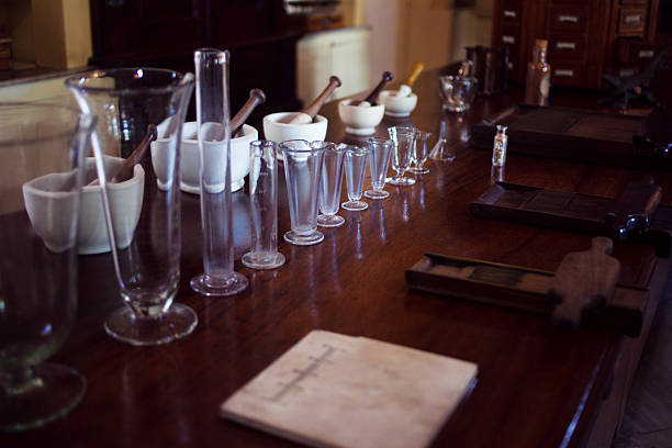 istock Vintage ceramic mortar and beakers. Chemical laboratory, pharmacy 636116456