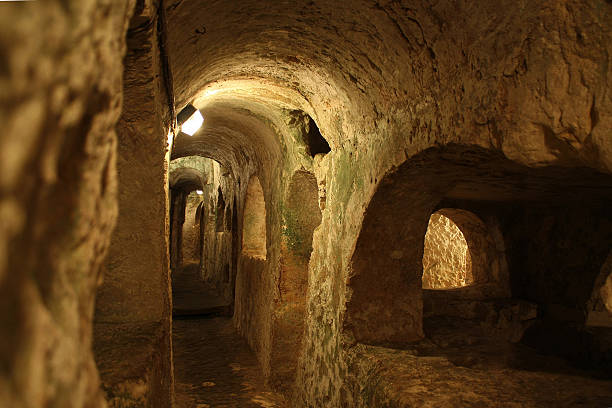 A bed where dead people were set to rest in mock houses in an ancient pre-roman necropolis built by Etruscan people in Central Italy