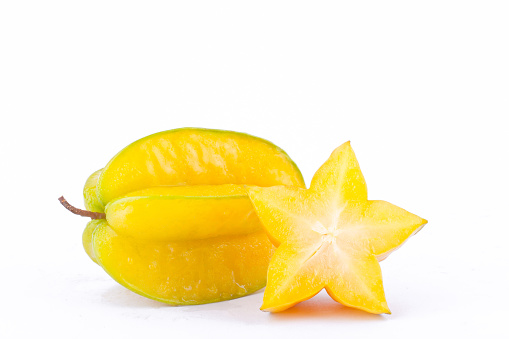 star fruit carambola or star apple ( starfruit ) on white background healthy star fruit food isolated ( side view )