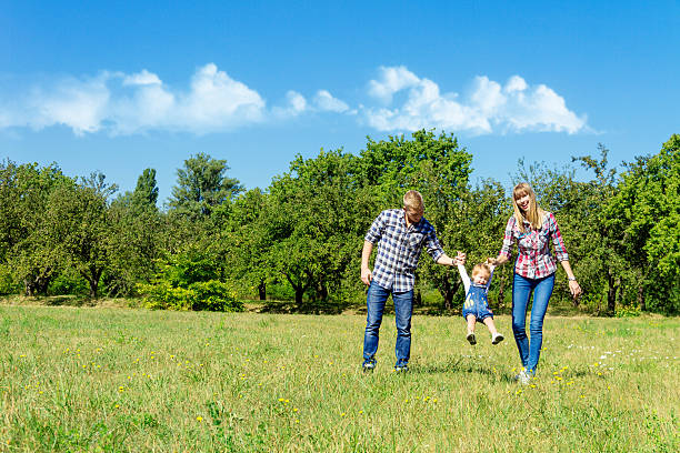 istock Happy family walking together 636121132