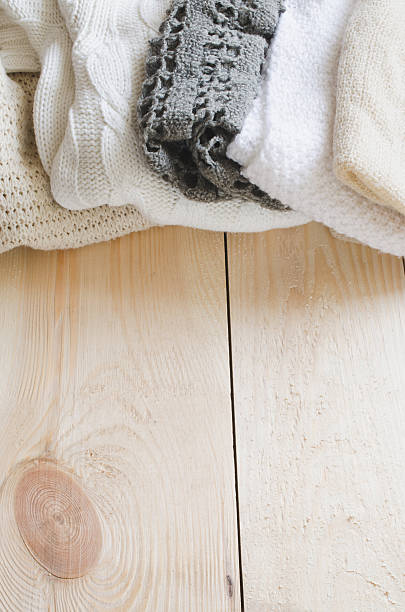 istock Cozy and soft winter background. Warm knitted clothes. 636122370
