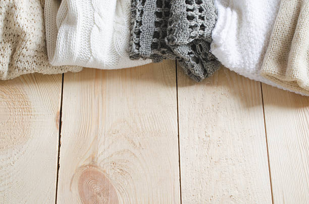 istock Cozy and soft winter background. Warm knitted clothes. 636122438