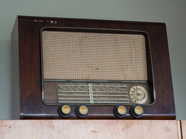 istock Old retro radio on a cupboard 636122736