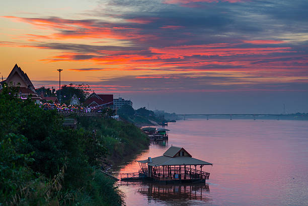 Stunning landscape at Nong Khai on the Mekong river, Thailand Stunning landscape at Nong Khai, Thailand, on the opposite Mekong river bank. Outstanding colorful cloudscape at dusk. nong khai province stock pictures, royalty-free photos & images
