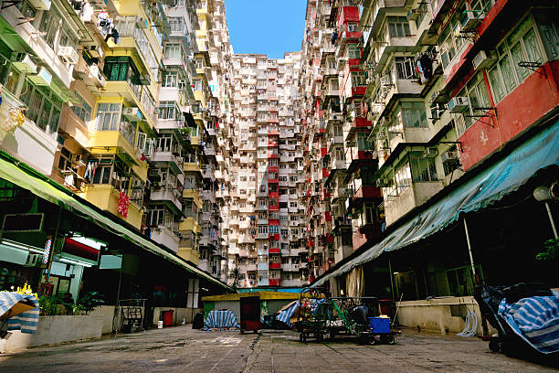 istock crowded apartment building in Hong Kong, China 636134776