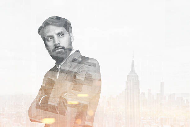 istock Bearded businessman in a large city 636141704