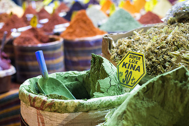 Henna in a sack with colorful spices background