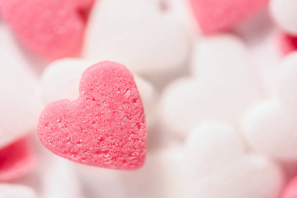 istock Pink and white decorative  sugar hearts 636148654