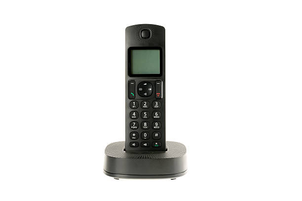 moderno teléfono inalámbrico dect con estación de carga - cordless phone telephone landline phone telephone receiver fotografías e imágenes de stock