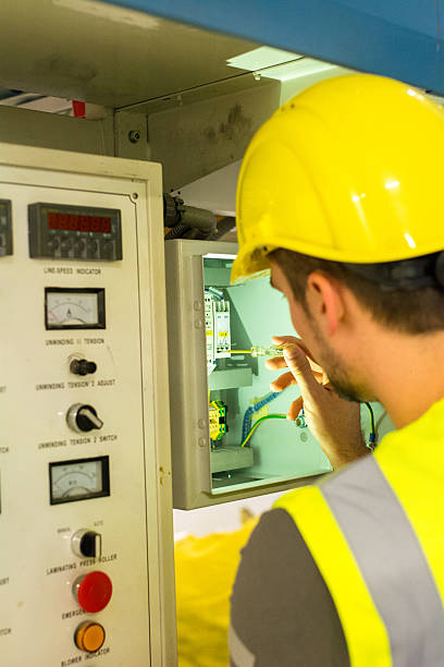 istock Industrial electrician 636151240