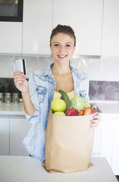 istock young woman doing some online shopping 636152174
