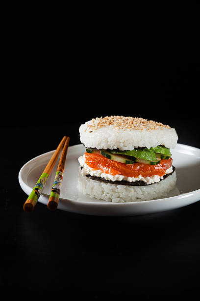 istock sushi plate with burger made from rice and smoked salmon 636152672