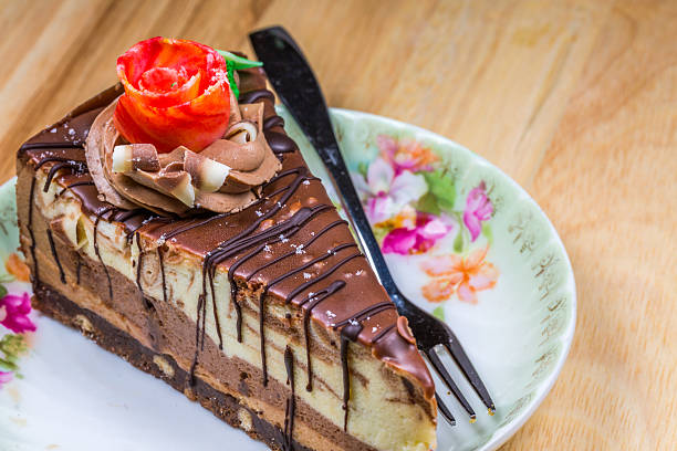 istock Chocolate cake on wooden table background 636152858