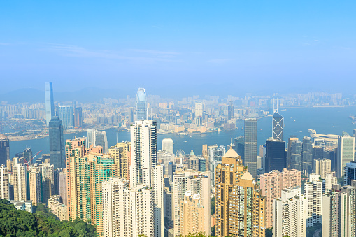 Hong Kong cityscape and Victoria Harbour, viewed from lugard road on the famous Victoria Peak.