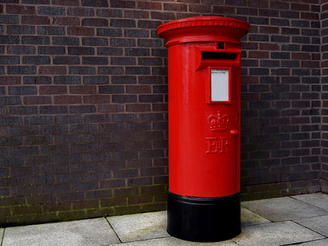 Red mailbox in Birmingham city center, United Kingdom 