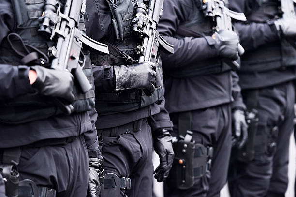 istock Soldier with machine gun during military parade 636156714