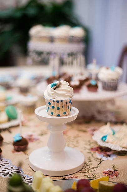 istock Delicious cupcake on table at childrens's birthday party 636164236