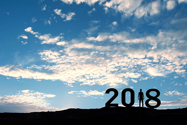 istock 2018, silhouette of a man standing in the sun 636164244