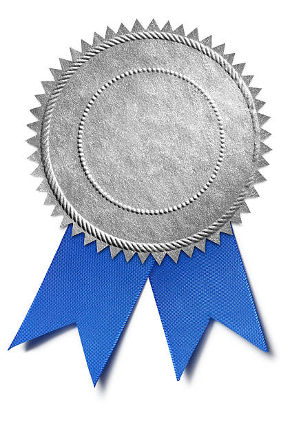 A silver award seal with a blue ribbon isolated on a white background.