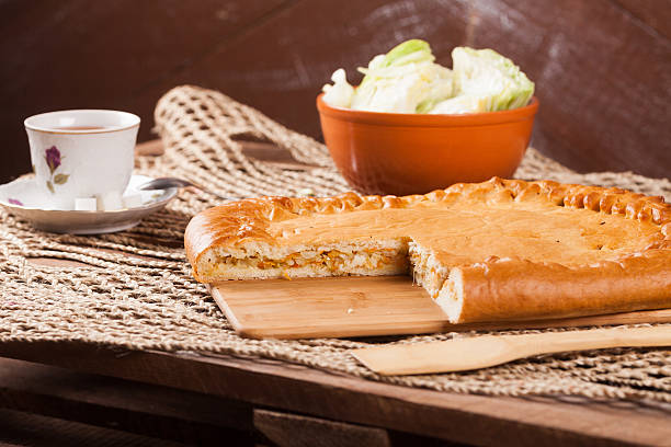 istock Pie on the table with food set 636166636