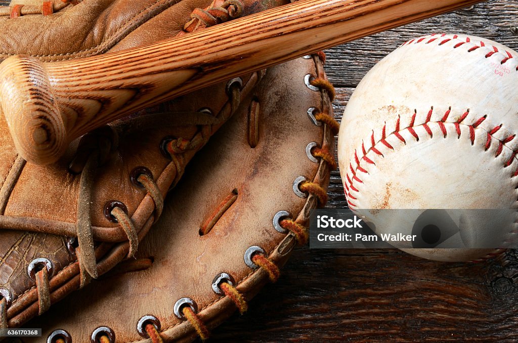 Baseball and Baseball Glove A top view image of an old used baseball, baseball glove, and baseball bat.  Baseball - Sport Stock Photo